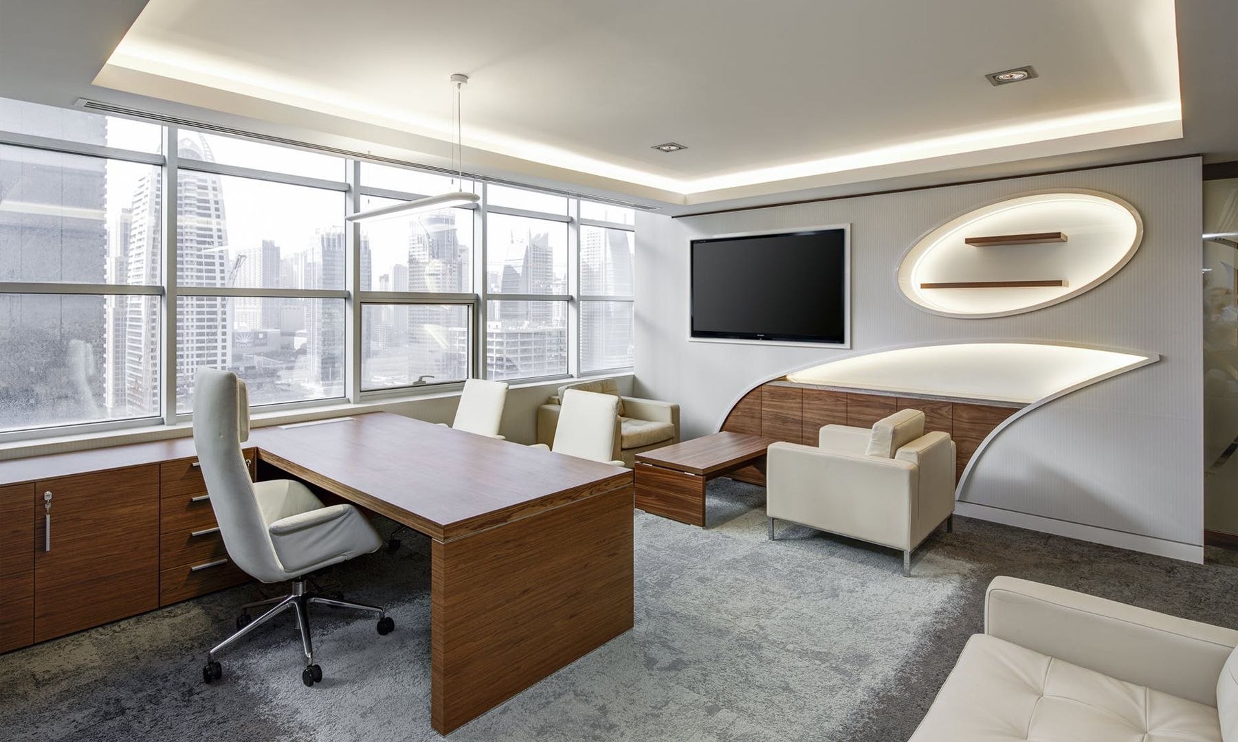 A warmly lit family living room designed by Aayani
